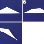 1. Салфетка сложена по диагонали лицевой стороной наружу (сгиб внизу).
2. Верхний угол заверни, образуя 