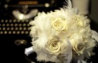 ivory-bridal-bouquet-roses-feathers
