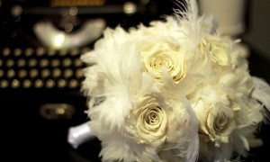 ivory-bridal-bouquet-roses-feathers