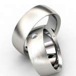 Свадебные кольца украшенные бриллиантом